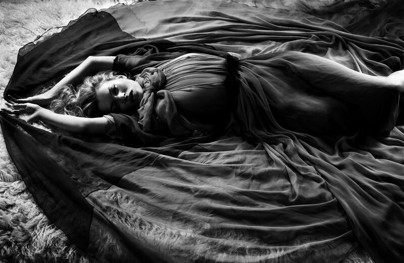 Woman in flowing fabric