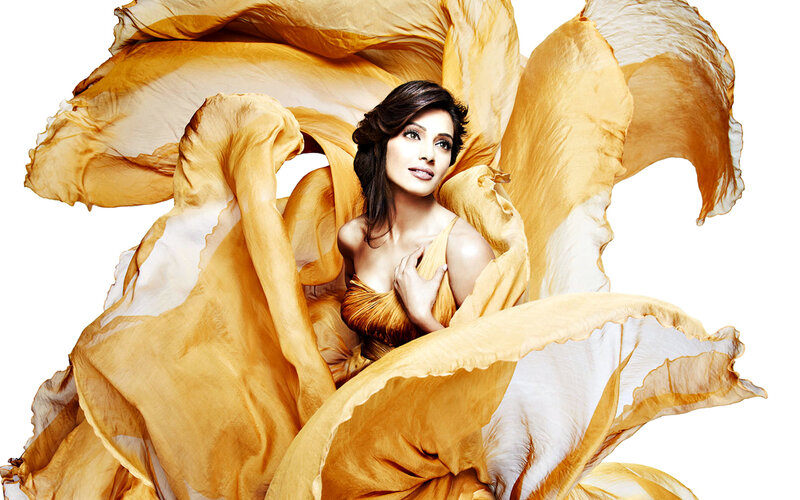 Woman in Flowing Fabric — Gold