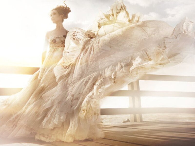 woman in flowing wedding dress