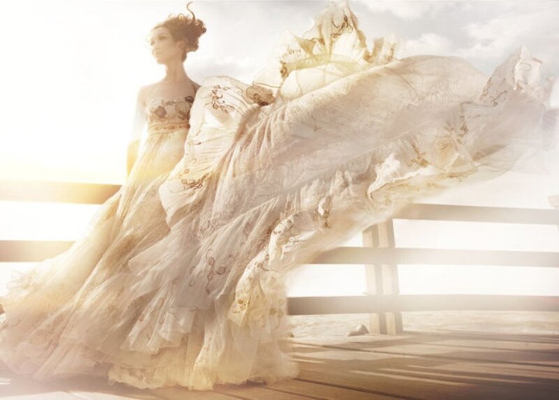 woman in flowing wedding dress