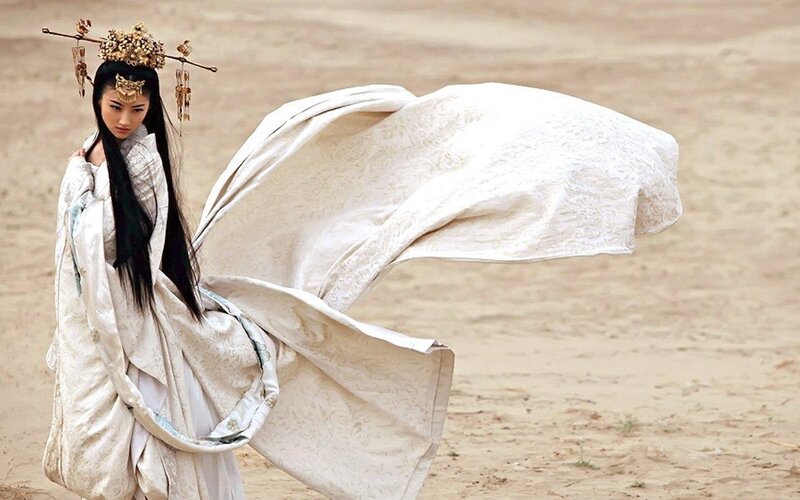 woman in flowing white robe