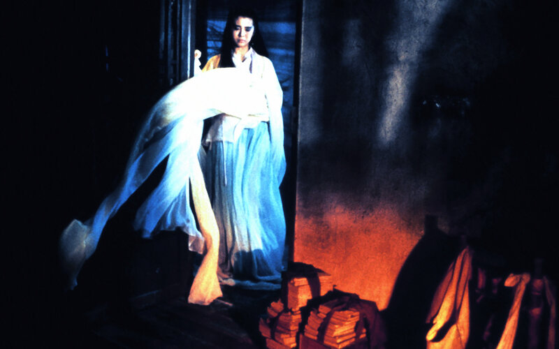 woman in flowing white robe