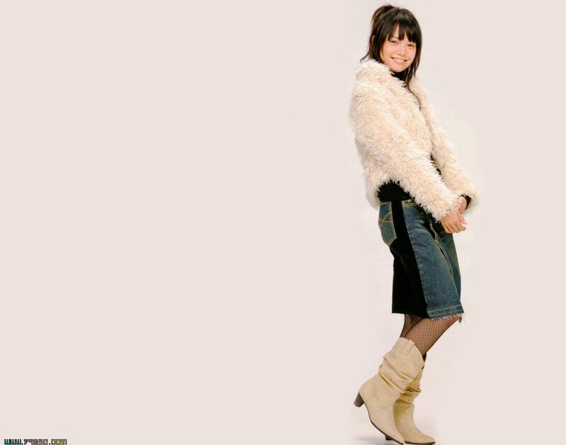 woman in fluffy coat and boots
