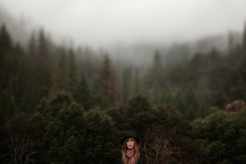 woman in foggy forest