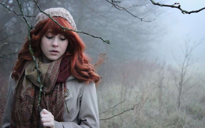 woman in foggy forest
