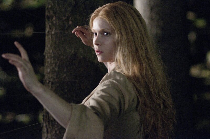 woman in forest at night