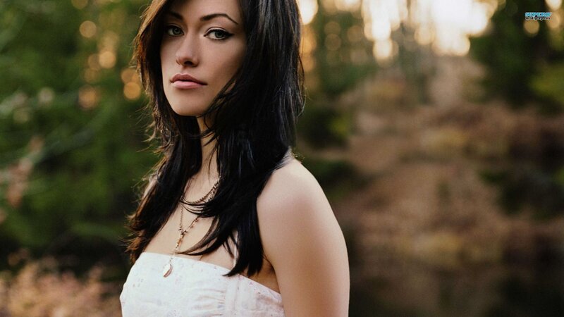 woman in forest at sunset