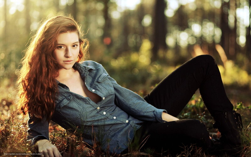 woman in forest at sunset