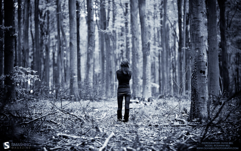 Woman in Forest — Black, Somber, Photograph, Trees, Forest Floor, Branches, White, Gray