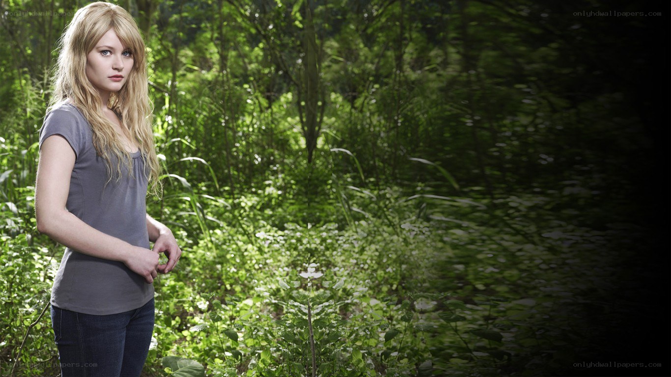 woman in forest clearing