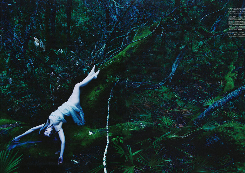 woman in forest clearing