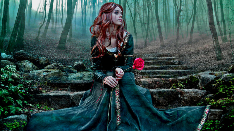 Woman in Forest Holding Rose