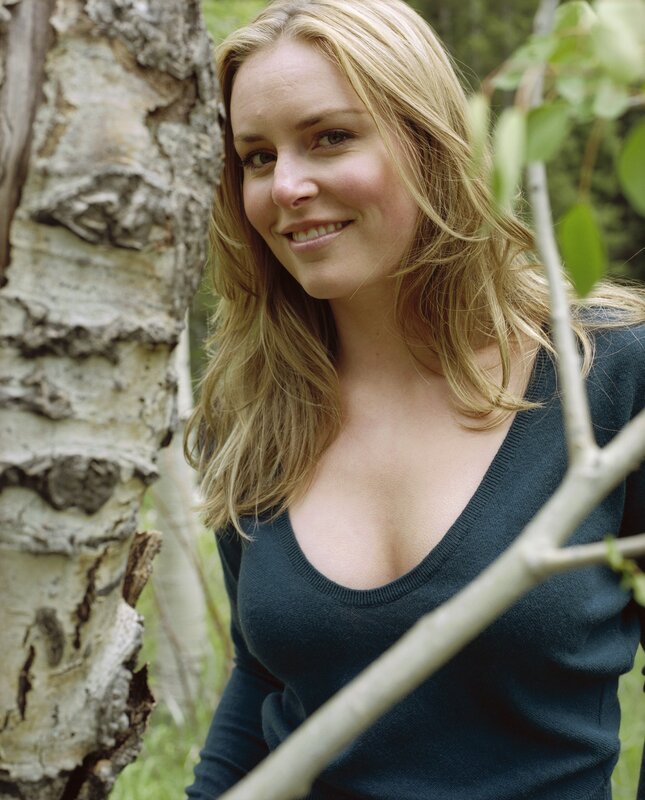 woman in forest near birch tree
