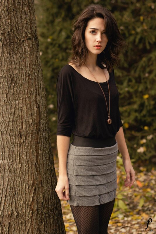 woman in forest near tree