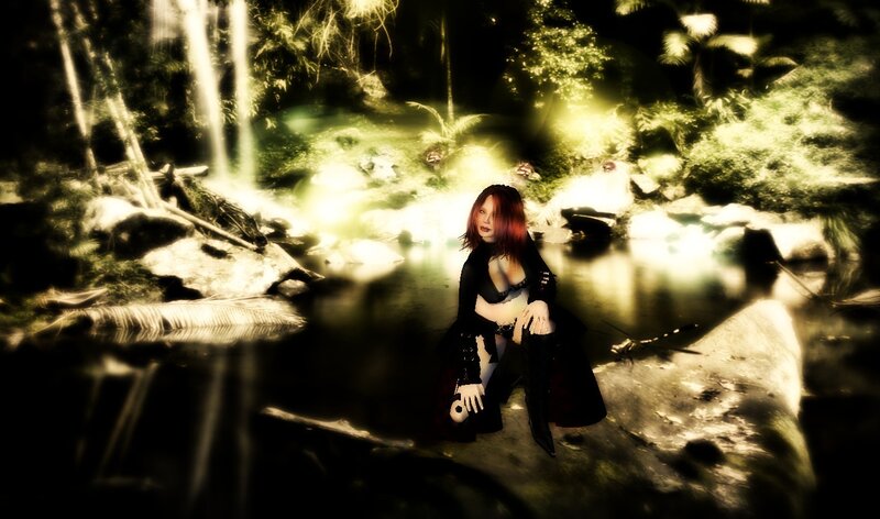 woman in forest near waterfall
