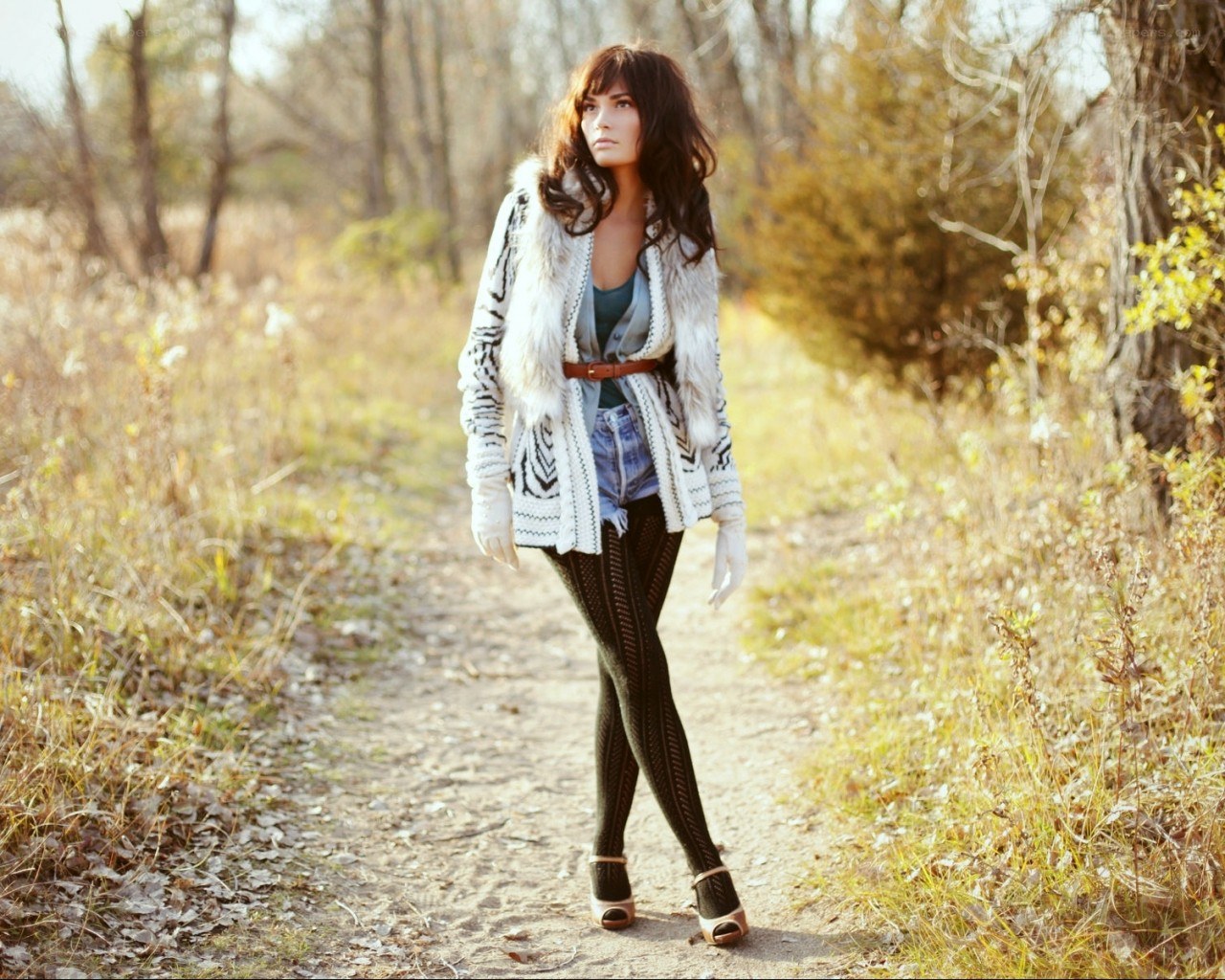 Woman in forest path