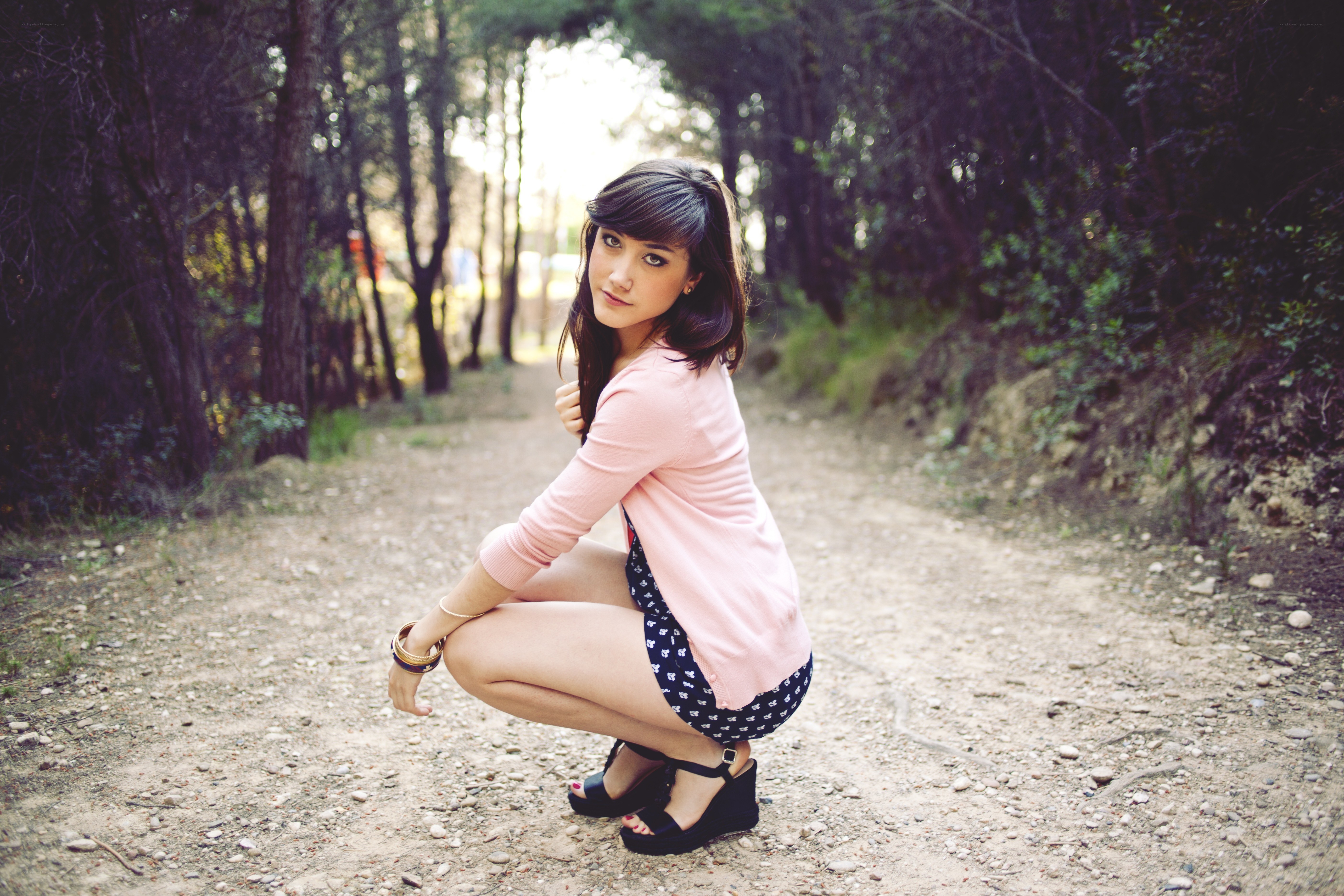Woman in forest path
