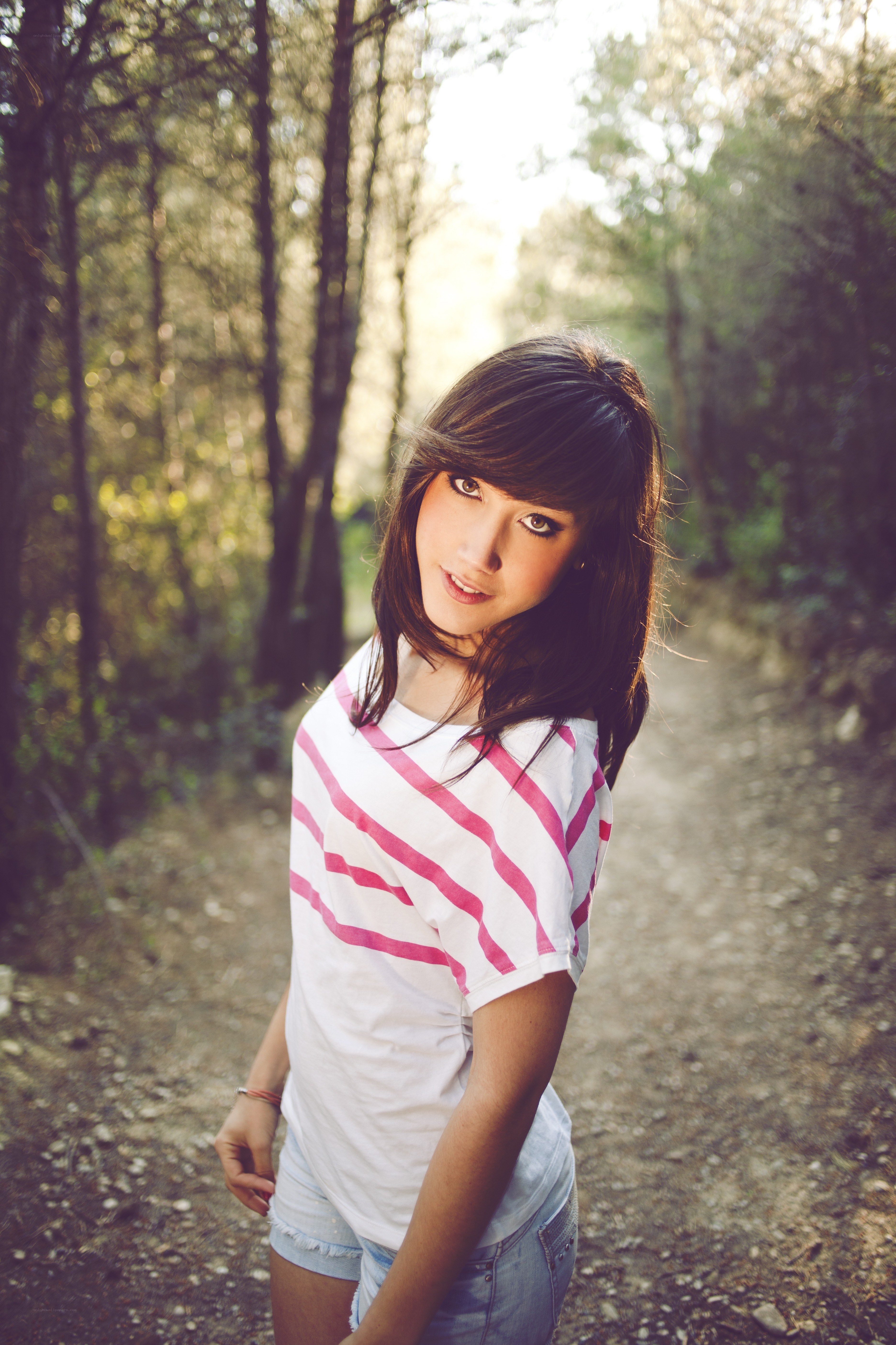 woman in forest path