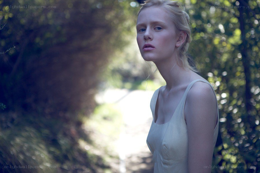 woman in forest path