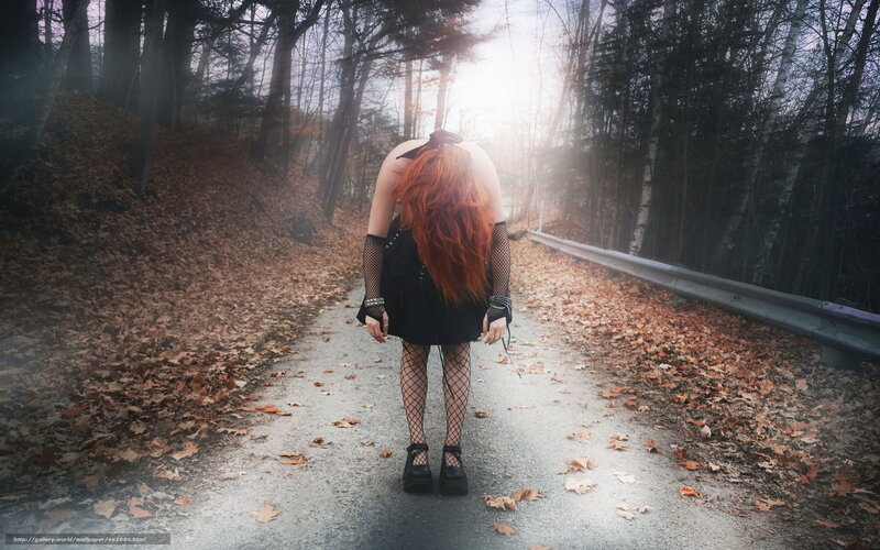 woman in forest path