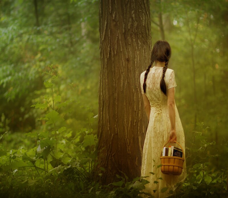 woman in forest with basket