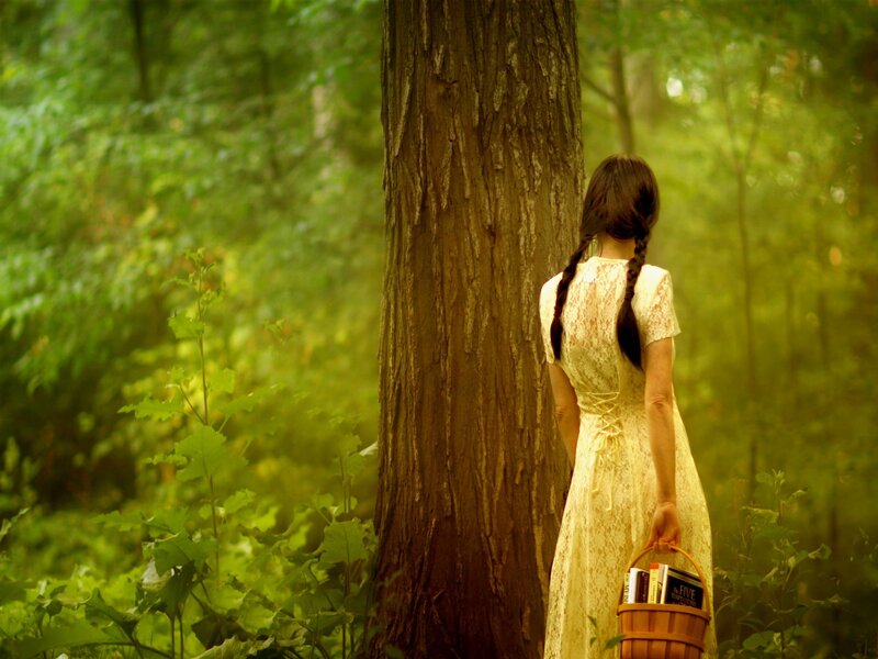 Woman in forest with basket