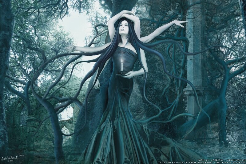 woman in forest with candle