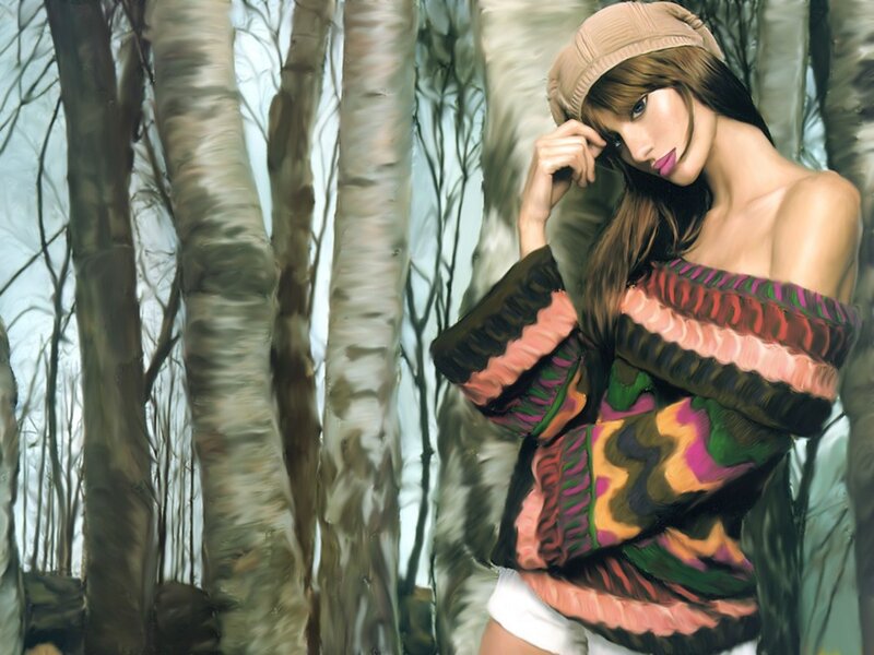 woman in forest with colorful sweater