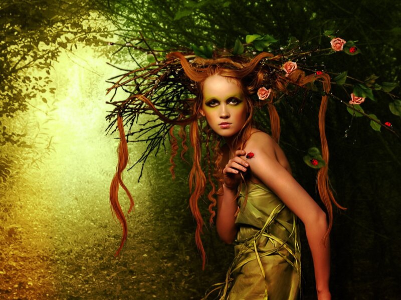 woman in forest with floral crown