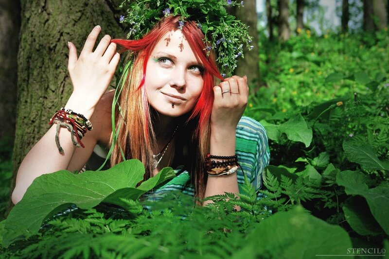 woman in forest with flower crown