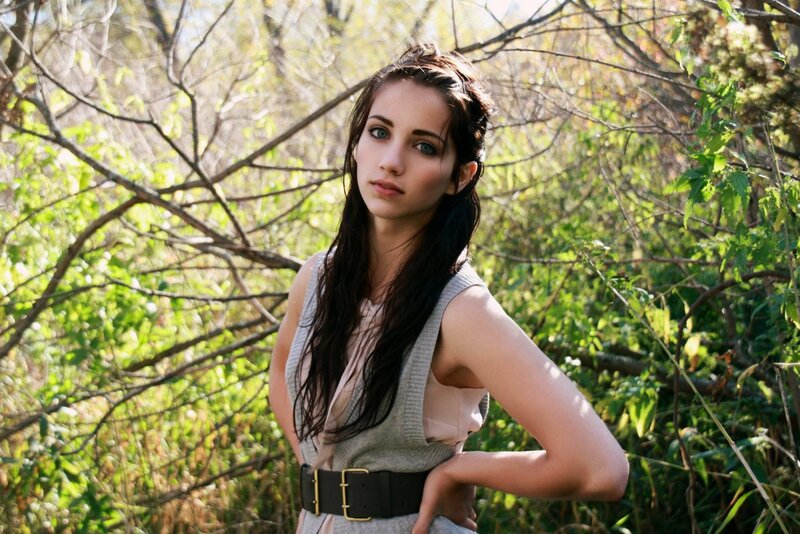 woman in forest with green eyes