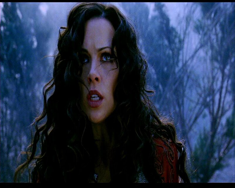 woman in forest with intense expression