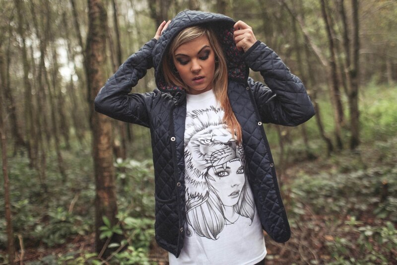 woman in forest with jacket