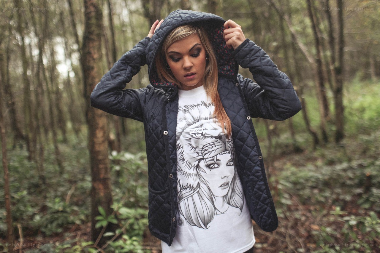 woman in forest with jacket