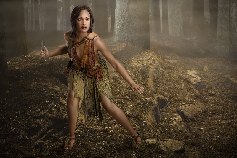 woman in forest with knife