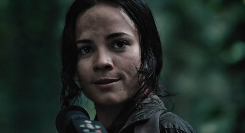 woman in forest with microphone