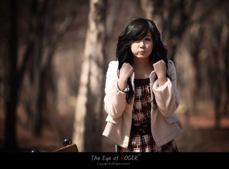 woman in forest with pout