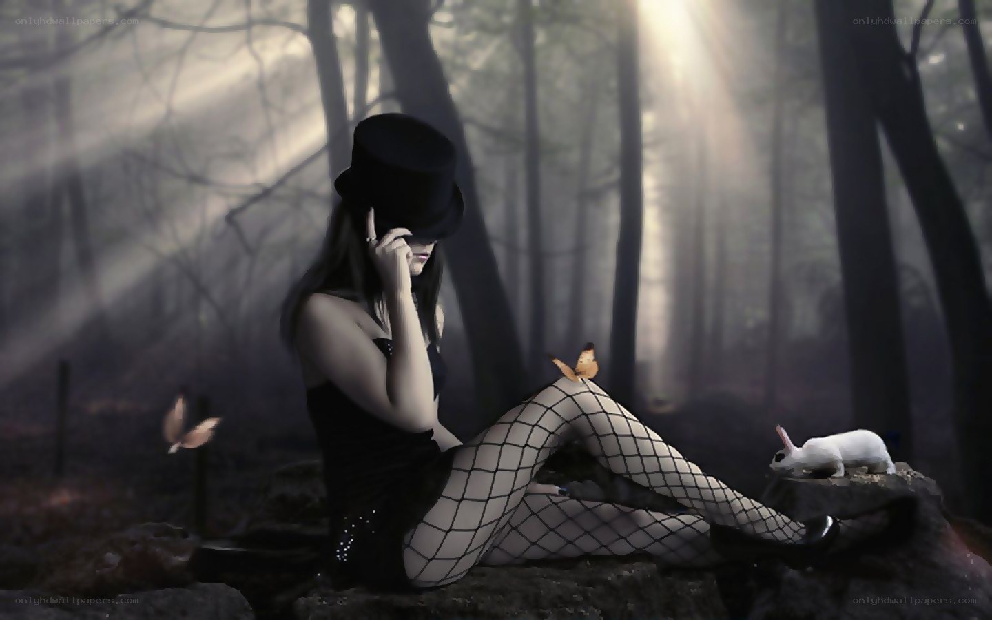 Woman in forest with rabbit
