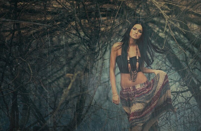 woman in forest with rain