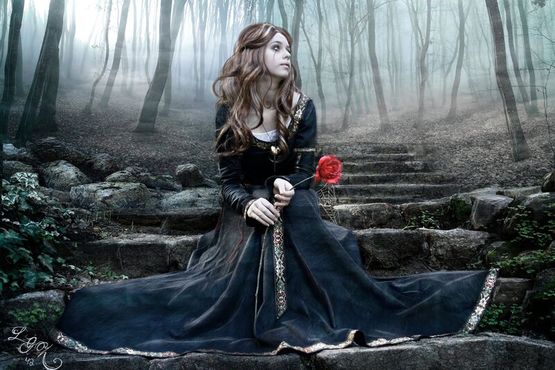woman in forest with rose