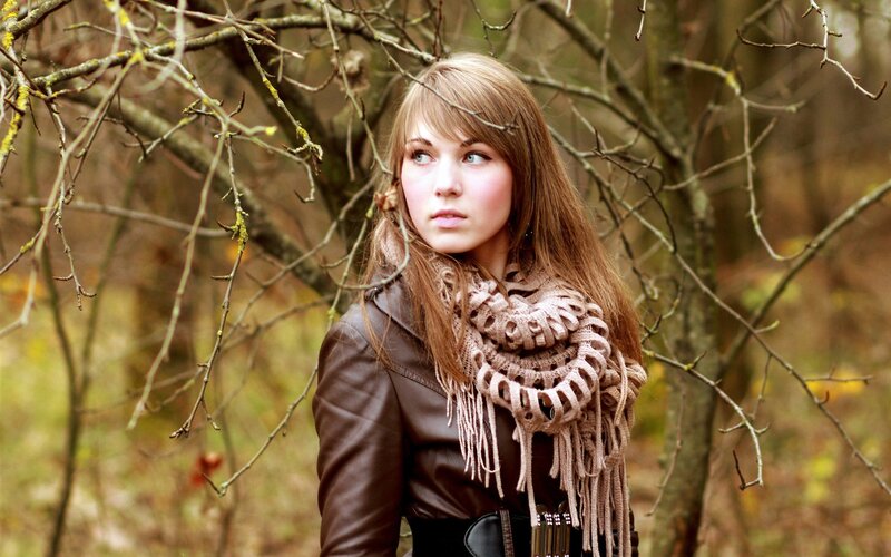 woman in forest with scarf