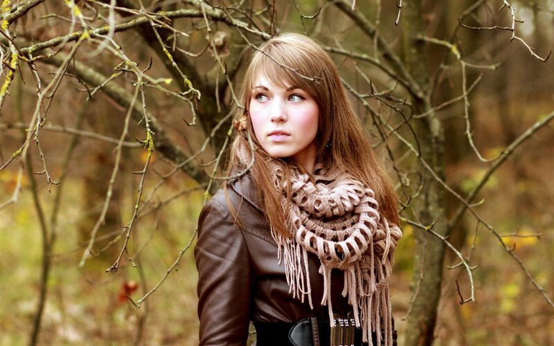 woman in forest with scarf