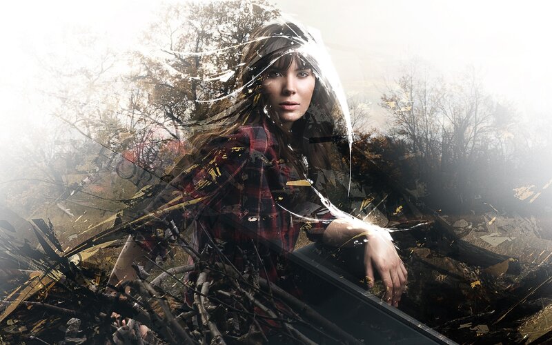 woman in forest with shattered glass