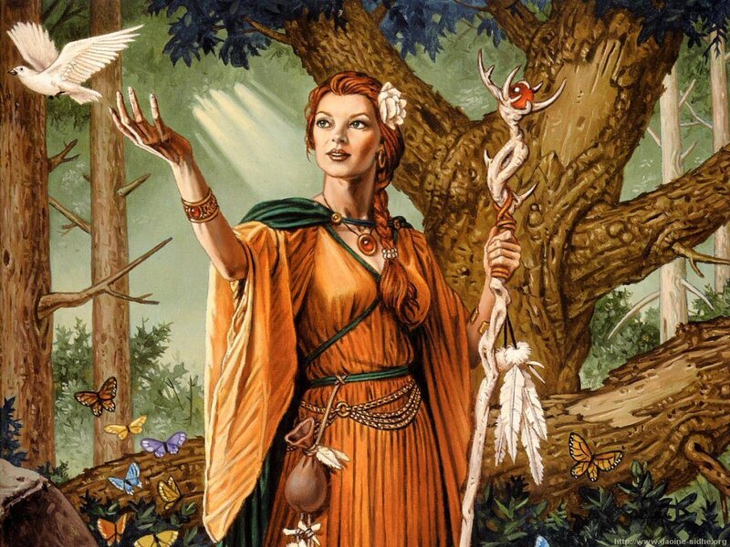 Woman in forest with staff