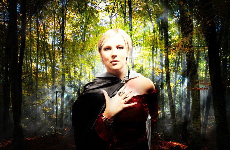 woman in forest with sunlight
