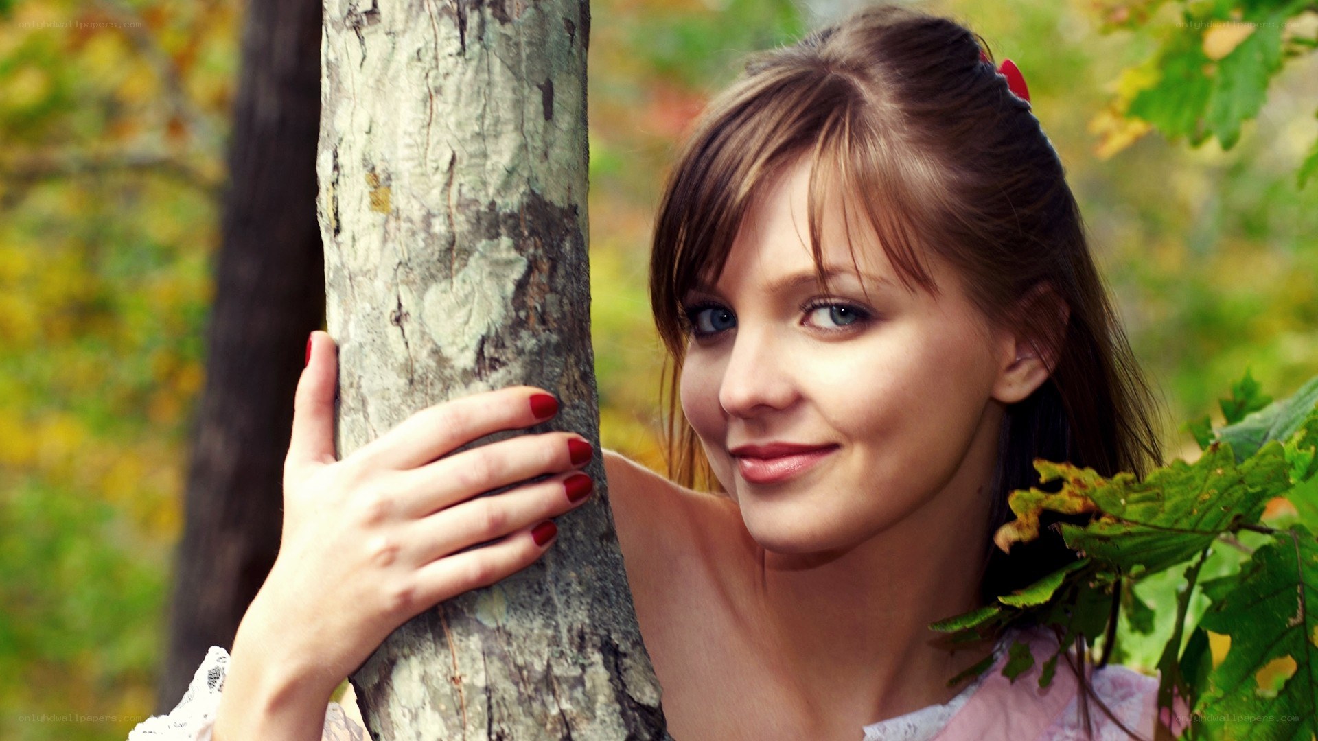 woman in forest with tree