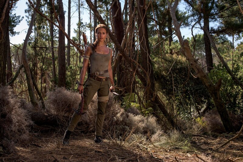 Woman in Forest with Weapons