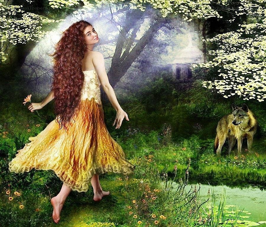 woman in forest with wolf