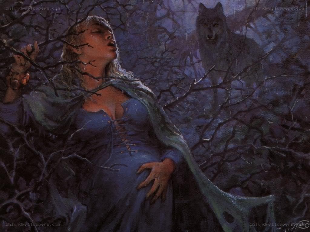 woman in forest with wolf