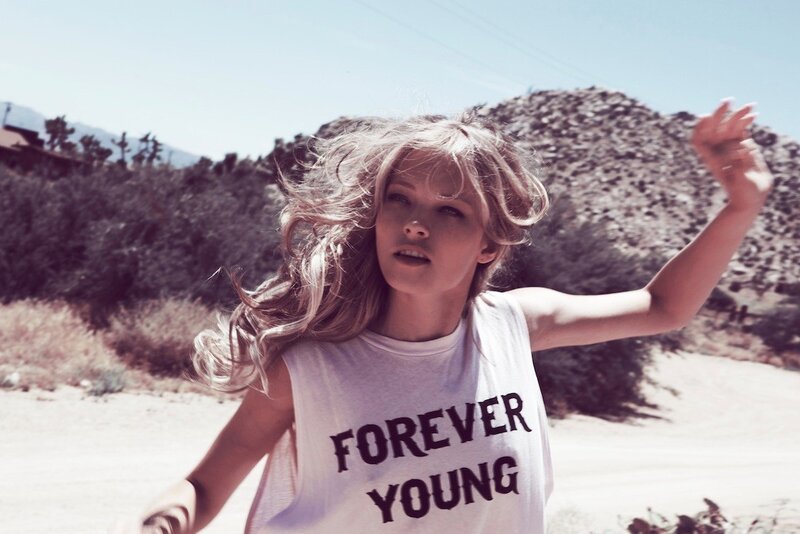 woman in forever young shirt